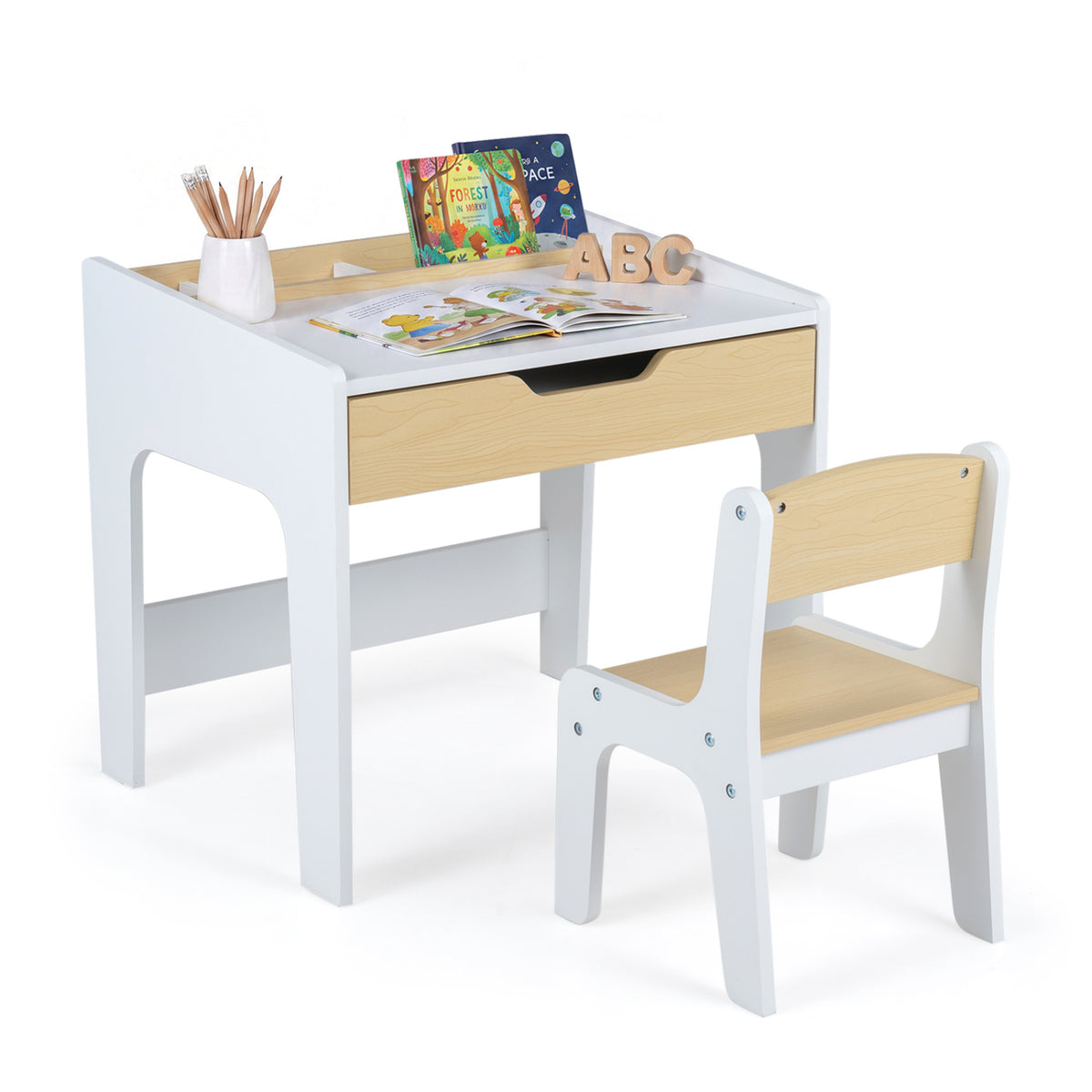 Desk and matching chair staged with books, pencils, and wooden alphabet blocks on the desktop.