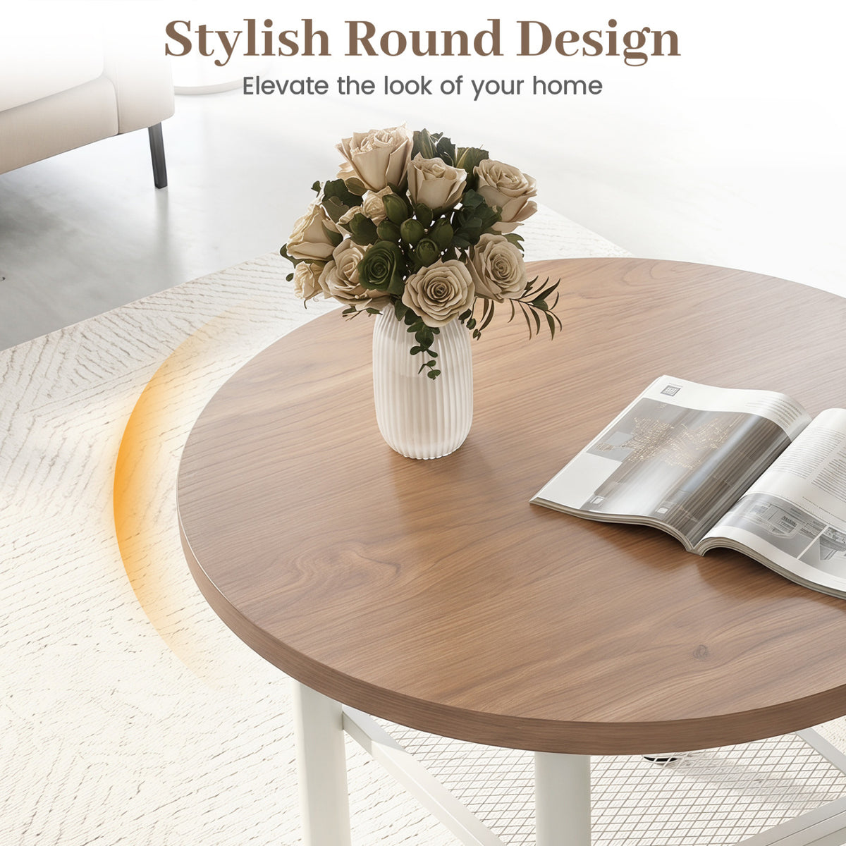 Wood-look round tabletop with a vase of roses and an open magazine, photographed from above.