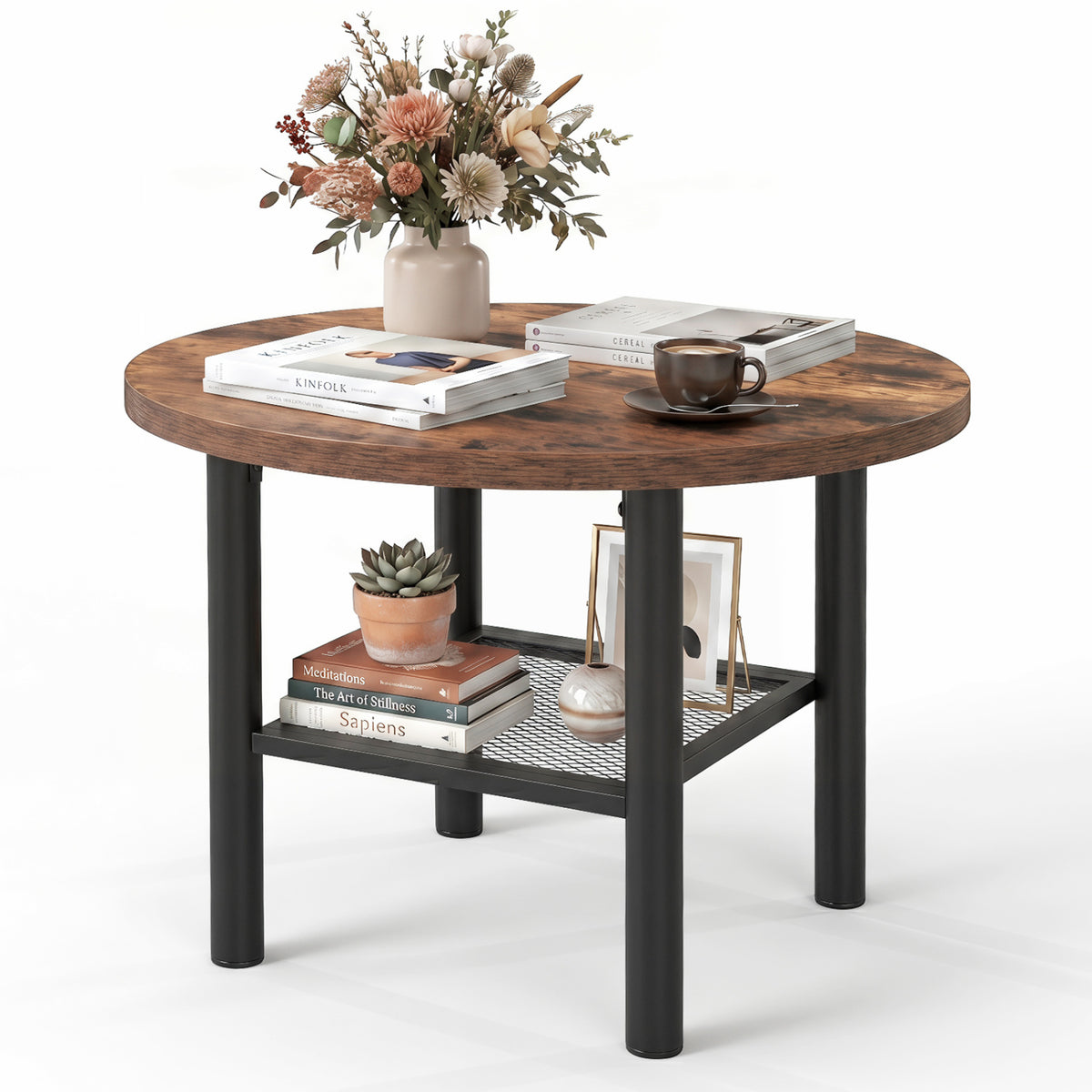 Round coffee table styled with books and decor on its top and lower mesh shelf.