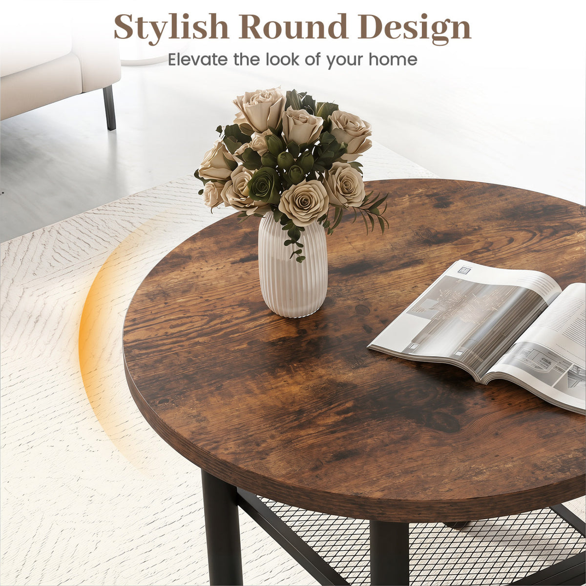 Overhead view of the round wood-look tabletop holding a flower vase and an open magazine.