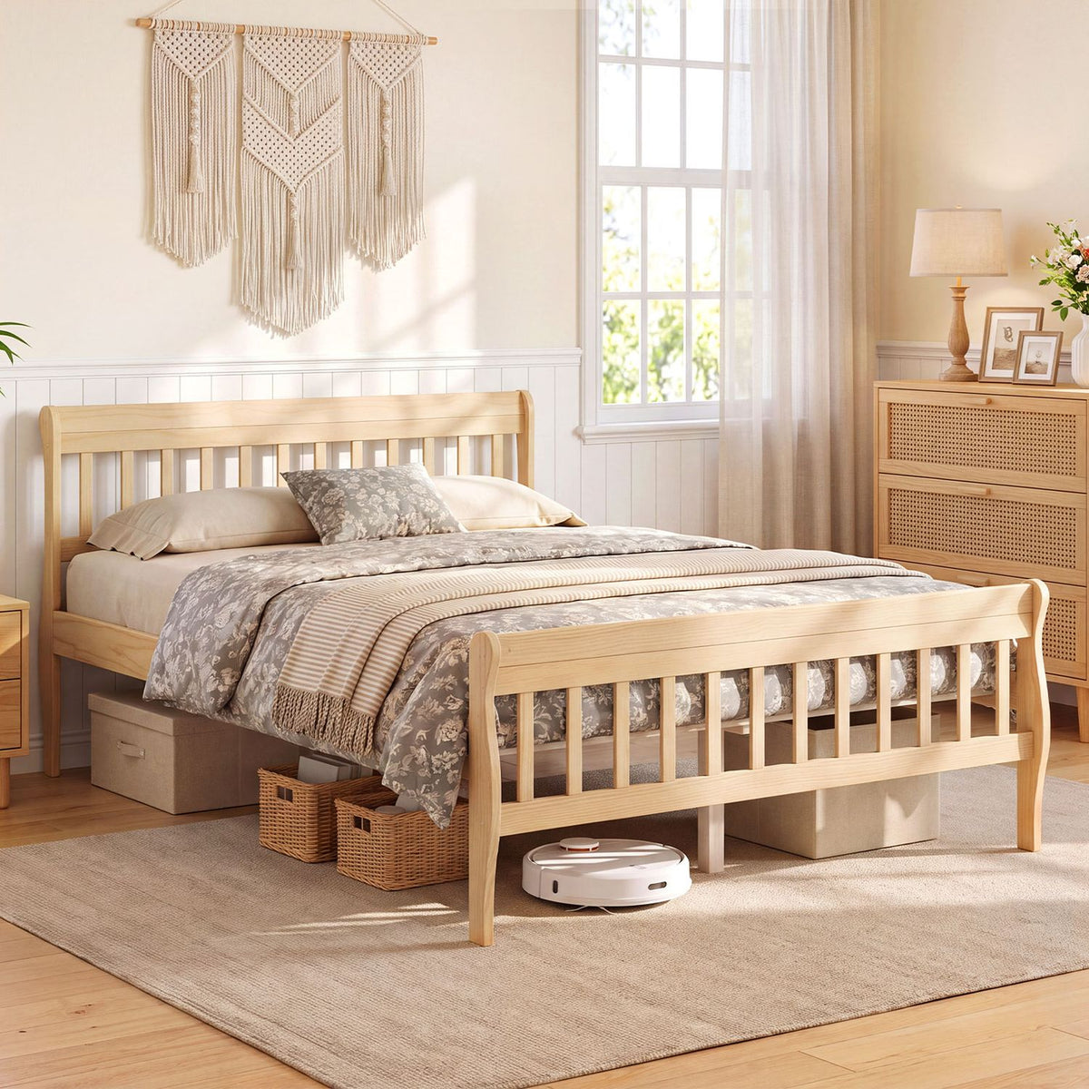 Light wood slatted bed shown from the side in a bright bedroom, with layered bedding and storage beneath.