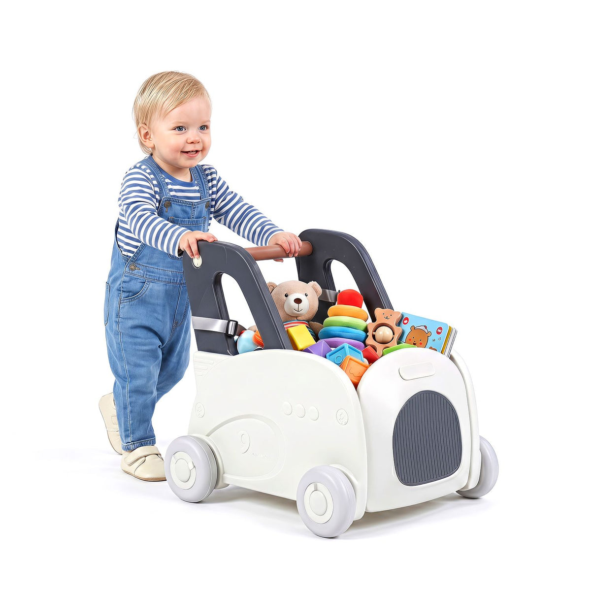 A child holds the walker as its storage area overflows with colorful toys and stuffed animals.