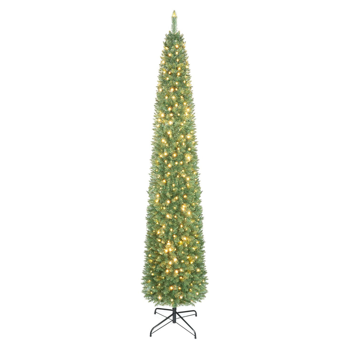 Slim green artificial Christmas tree glowing with warm lights on a metal base against white.