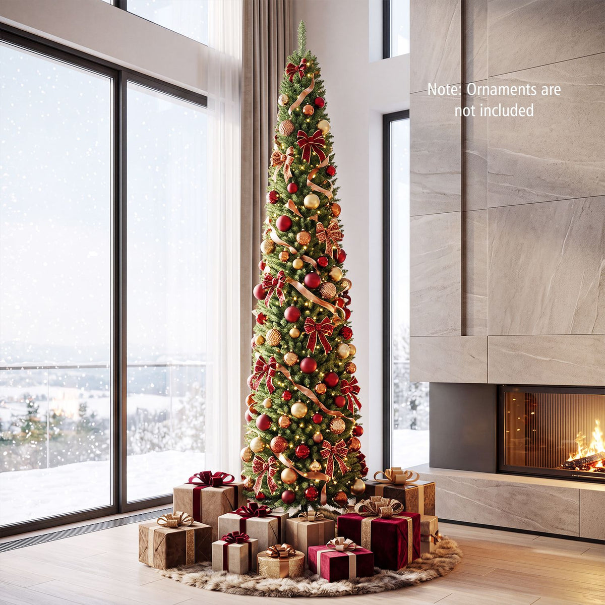 Tall narrow Christmas tree decorated with red and gold ornaments and presents beside a fireplace.