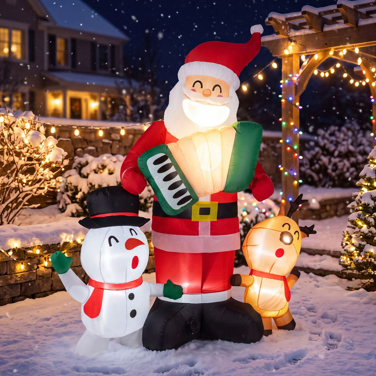 Illuminated Santa holding an accordion stands between a snowman and reindeer in a snowy yard.