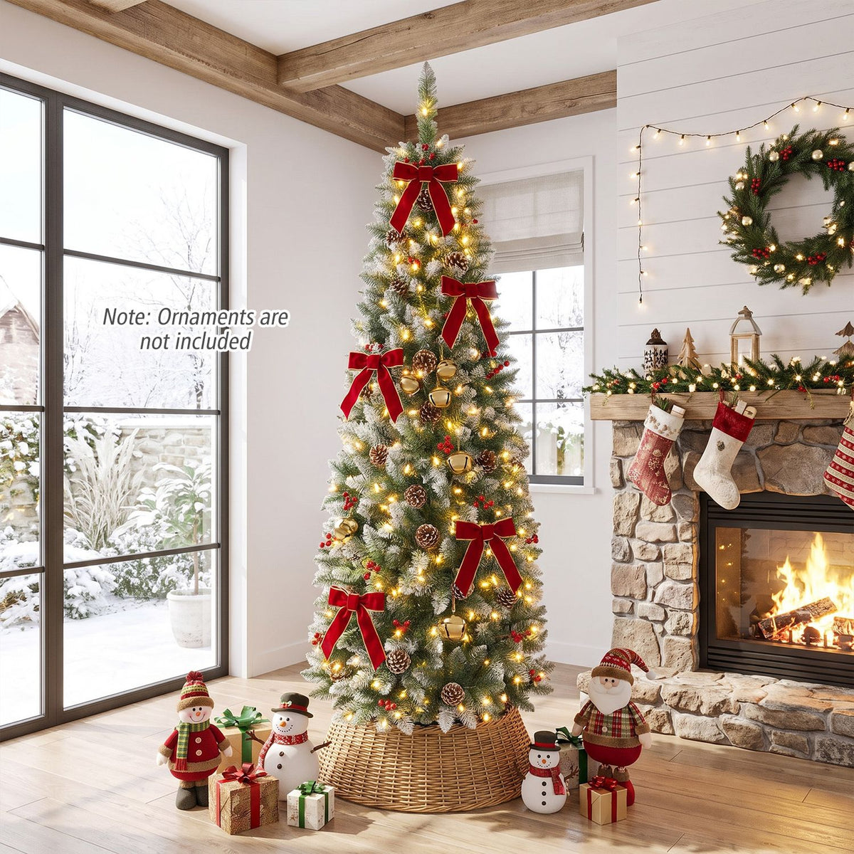 Frosted pencil tree with warm lights and red bows beside a stone fireplace, with gifts at its base.