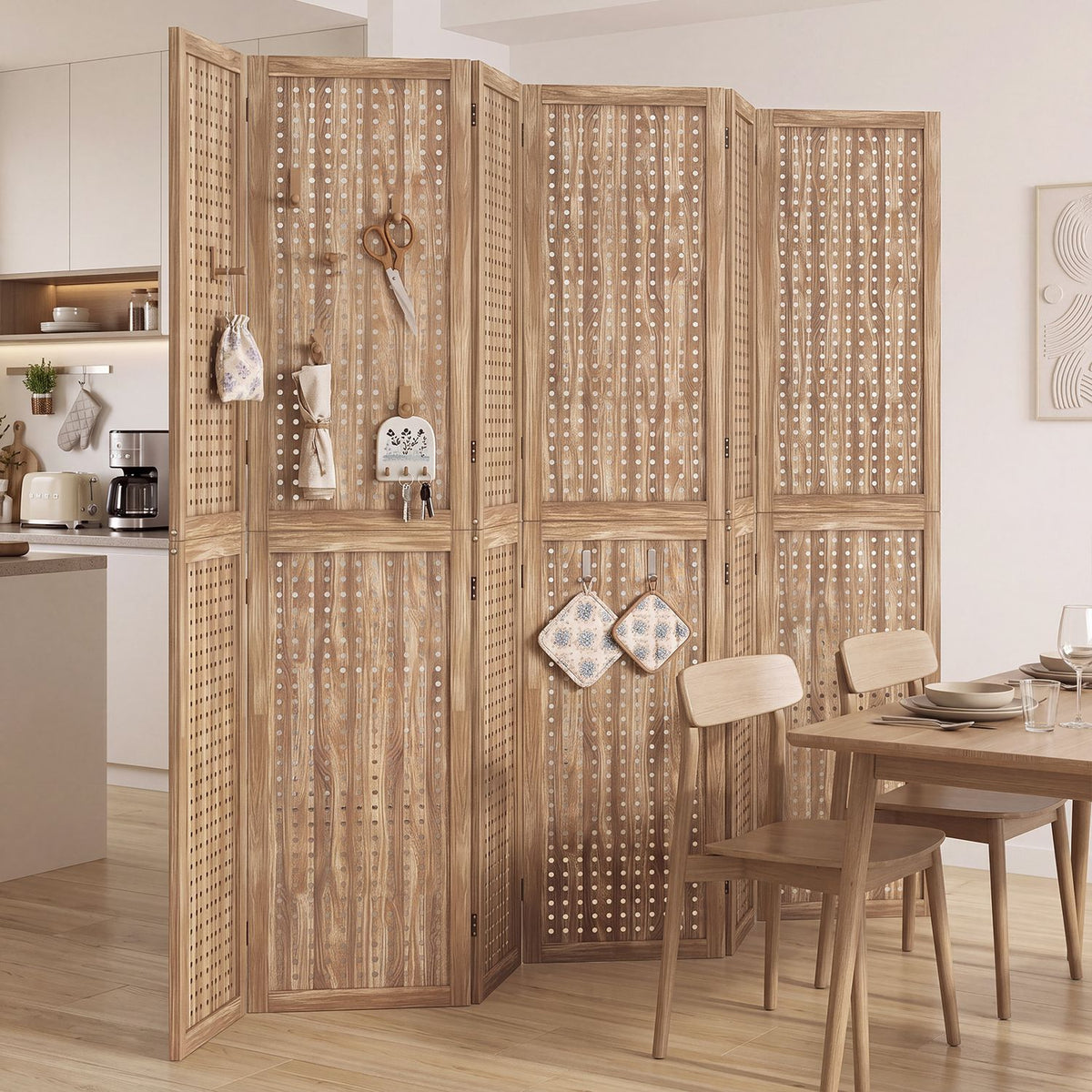 Wooden pegboard divider separates a kitchen from a dining area, with small items hanging on its panels.