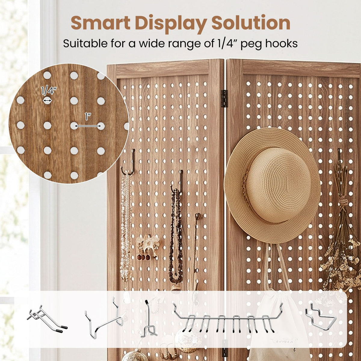 Perforated wooden panels displayed with hanging accessories and a hat, alongside assorted metal peg hooks.