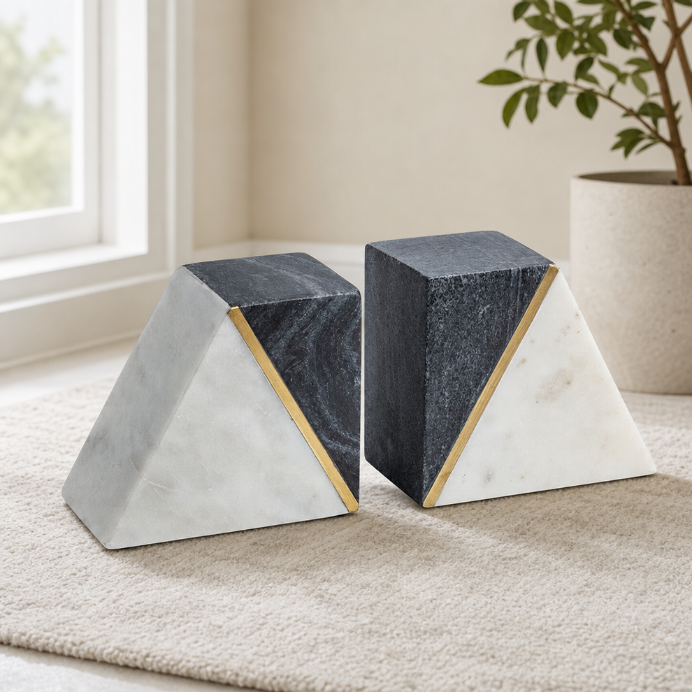 Marble Bookends with Brass Accent, White & Grey (Set of 2) centered in a warm neutral furnished room