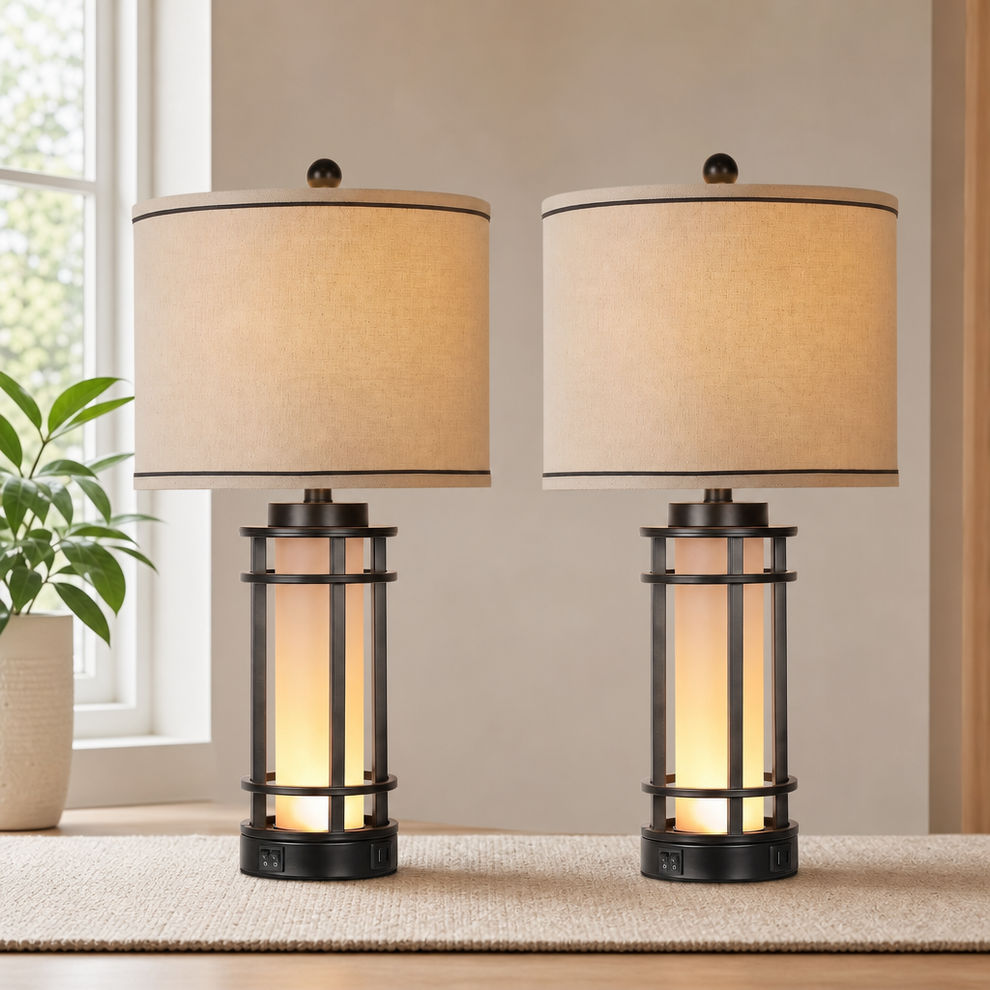 Pair of 25-inch table lamps with soft fabric drum shades and frosted glass inner columns on a console table.
