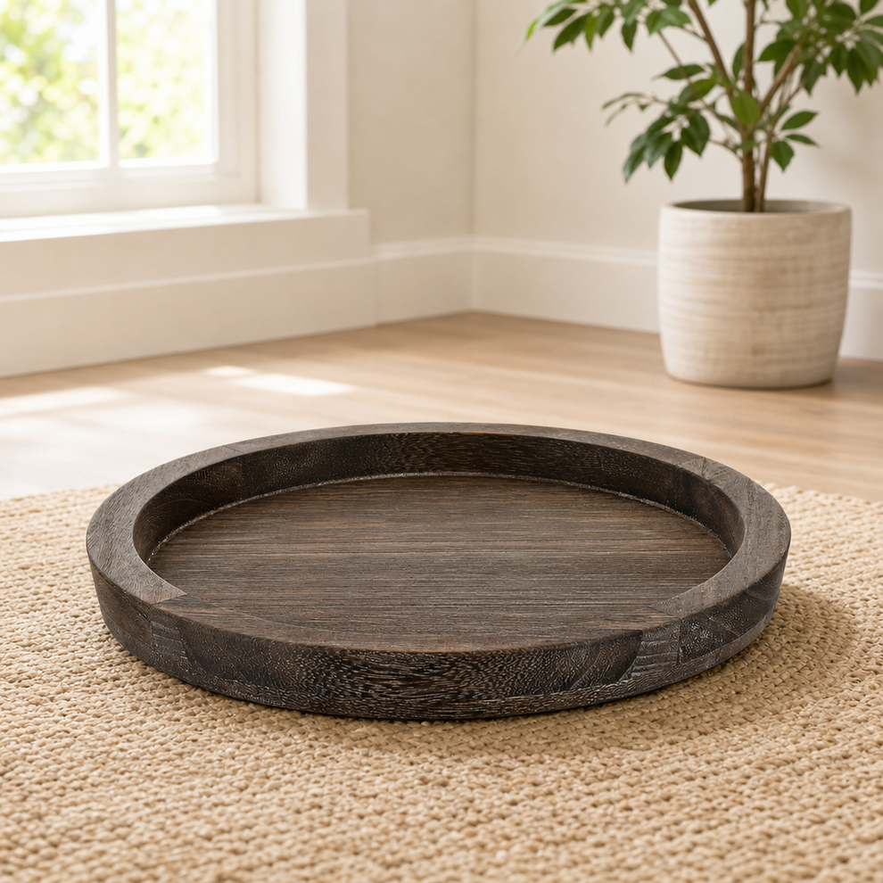 Round Wooden Tray — Paulownia Decorative & Serving Tray, Rustic Finishes, Multiple centered in a warm neutral furnished room