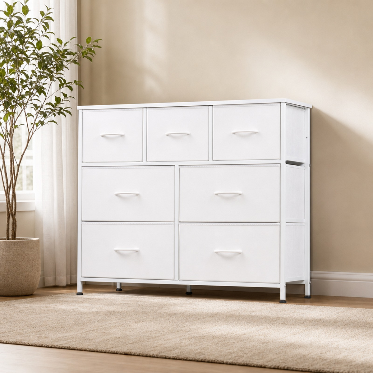 White seven-drawer dresser in a bright room, angled front view