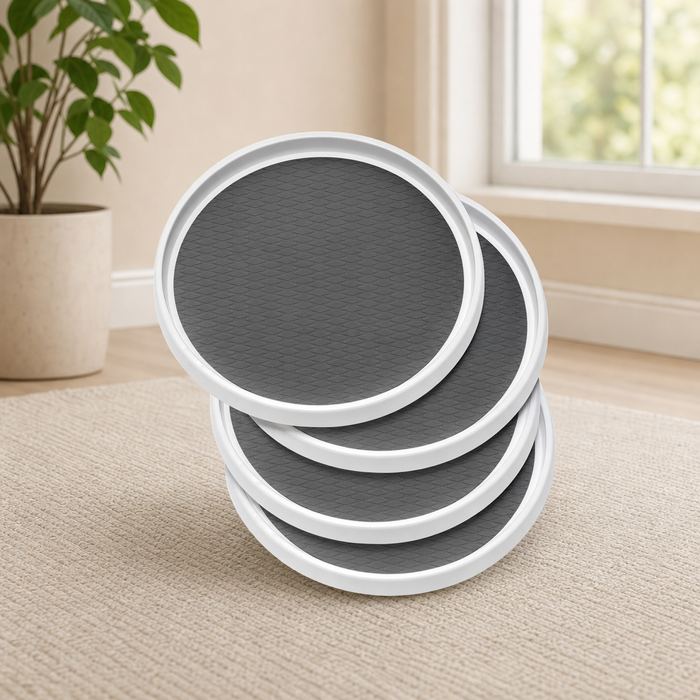 Stack of four white-rim round turntables with dark textured non-slip centers, angled front view