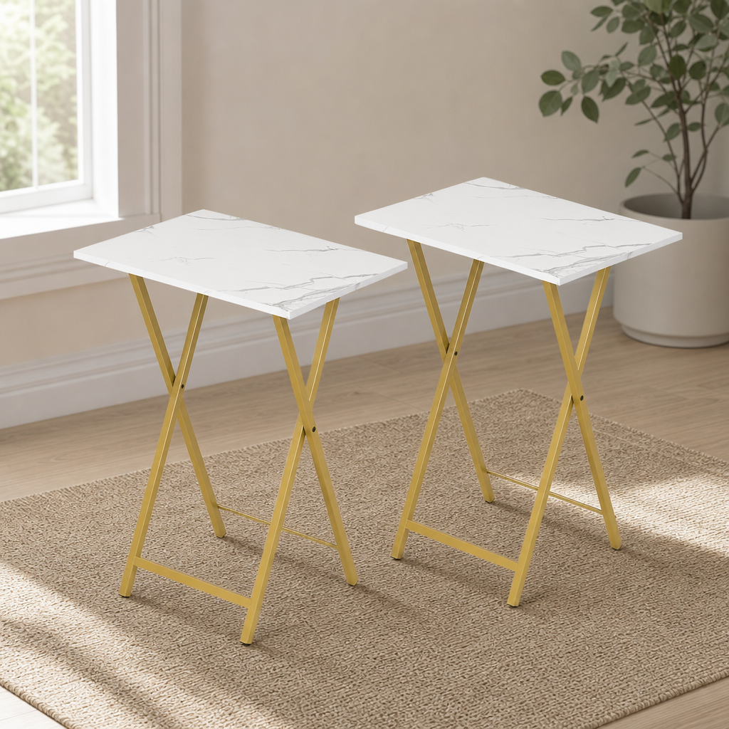 Marble-pattern tabletop with gold metal folding legs angled front view on a woven rug