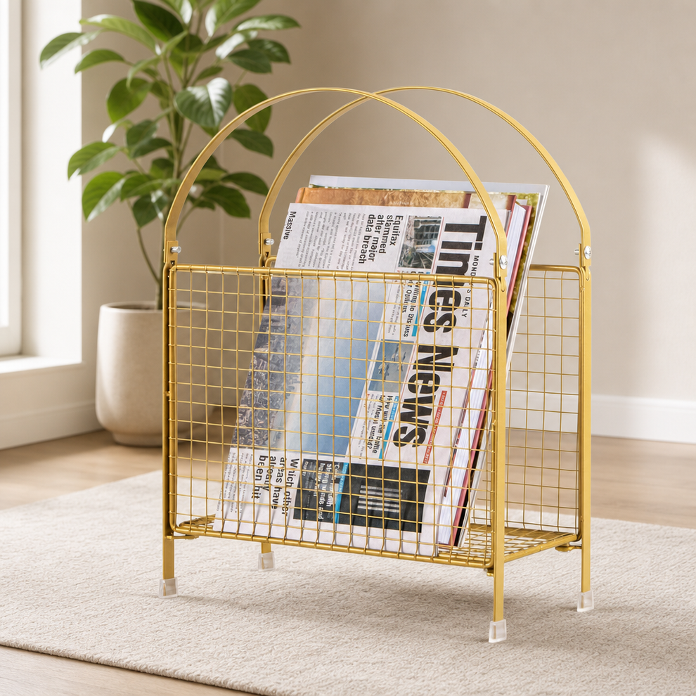Freestanding Magazine Rack — Metal Mesh Handbag-Style, Gold or Black centered in a warm neutral furnished room
