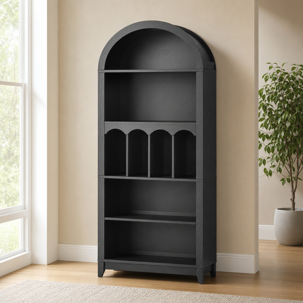 Black arched 5-tier bookcase full front view beside a window on hardwood floor