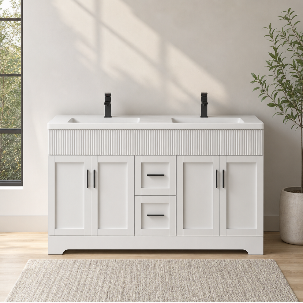 White double-sink bathroom vanity front view with ribbed wave-pattern band and black faucets in a staged bathroom