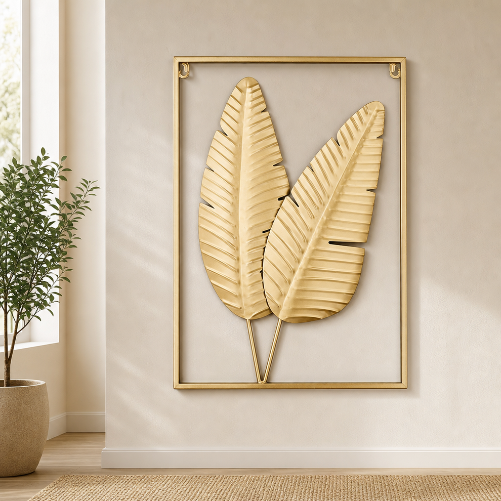Metal Wall Decor — Gold 3D Leaf Frame Wall Art (Leaf & Elephant) centered in a warm neutral furnished room