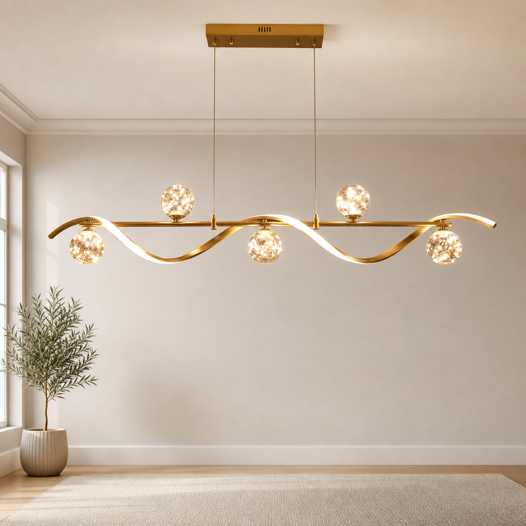 Gold Linear Glass Globe Kitchen Island Pendant Light, 4-Light or 6-Light centered in a warm neutral furnished room