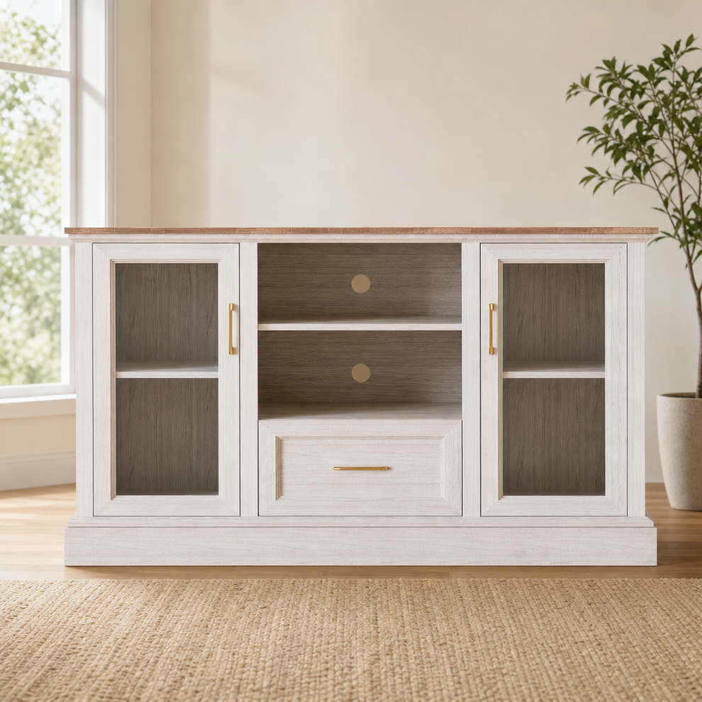 Farmhouse TV Stand with Tempered Glass Doors, MDF Construction, Rustic White centered in a warm neutral furnished room