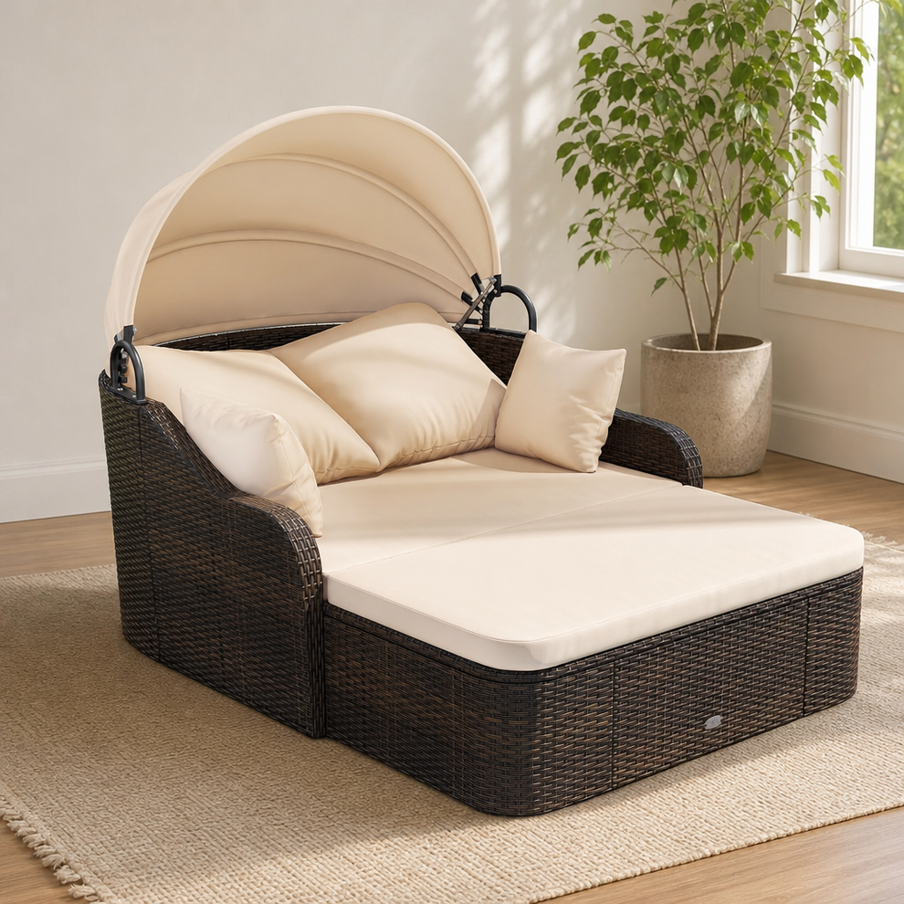 75.5-Inch PE Rattan Outdoor Daybed with Retractable Canopy and Ottoman centered in a warm neutral furnished room
