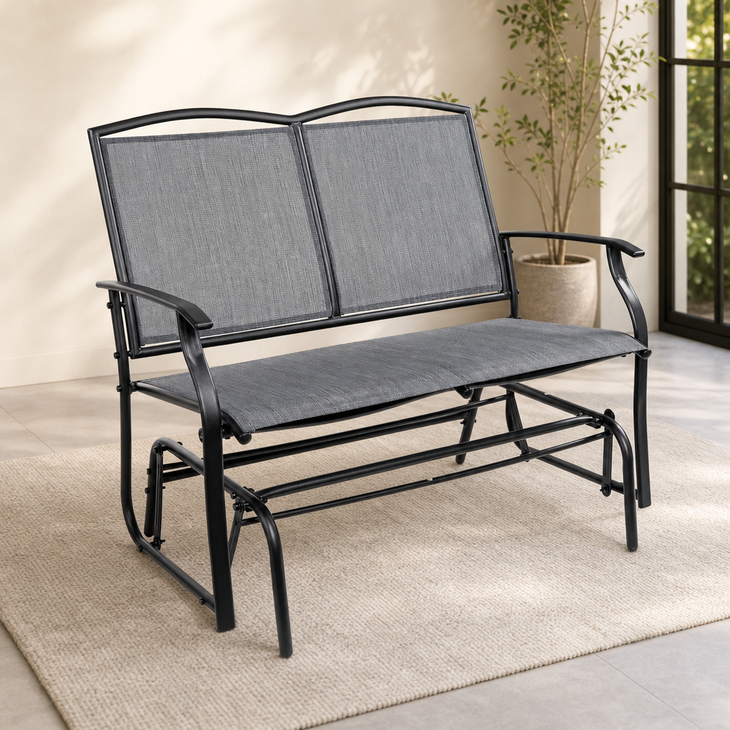 Gray mesh two-seat gliding bench angled front view in a bright room