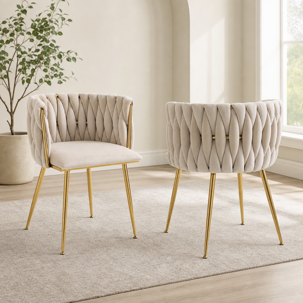 Velvet Dining Chair Set with Curved Back, Integrated Armrests and Gold Metal Legs centered in a warm neutral furnished room