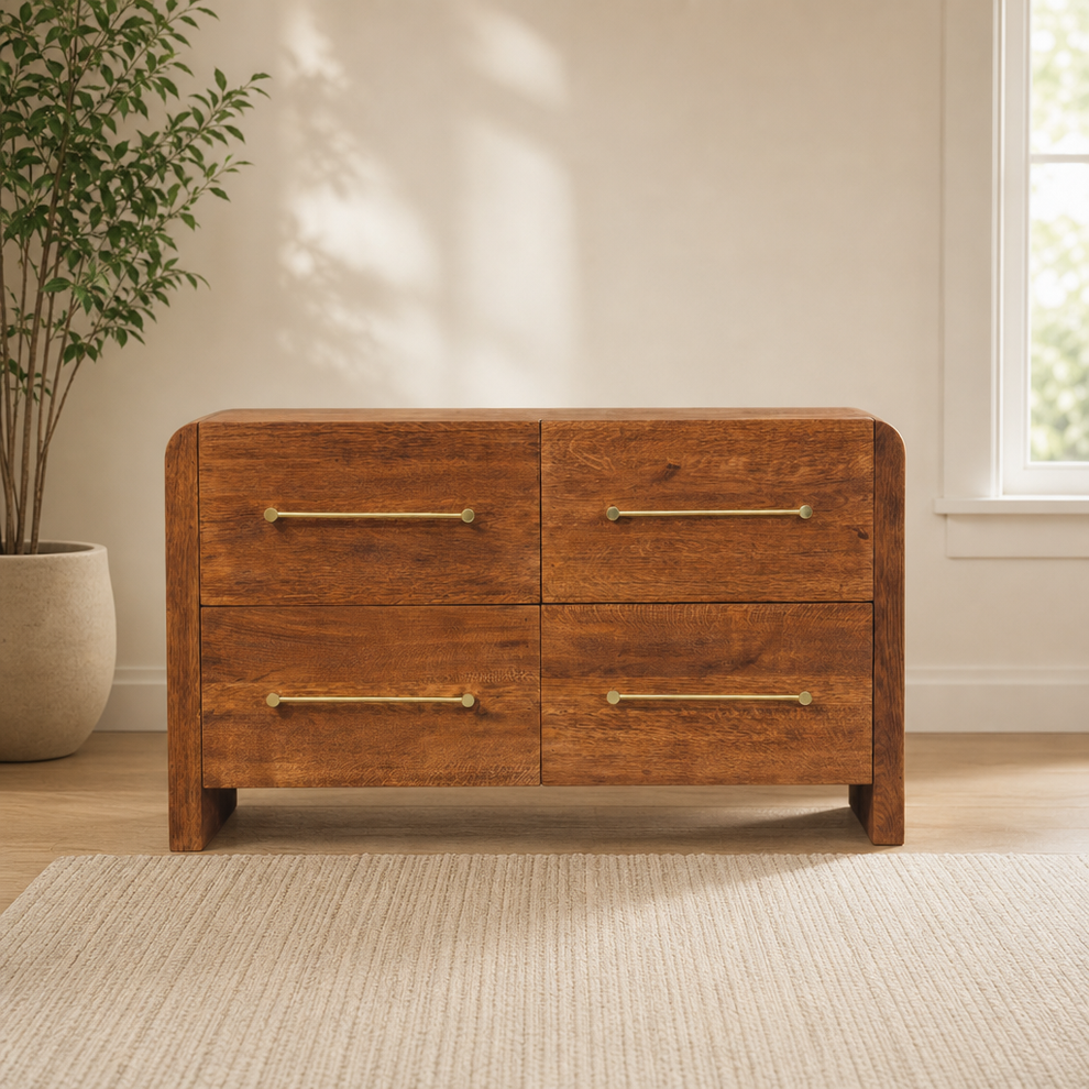 Aurelio Four Drawer Chest centered in a warm neutral furnished room