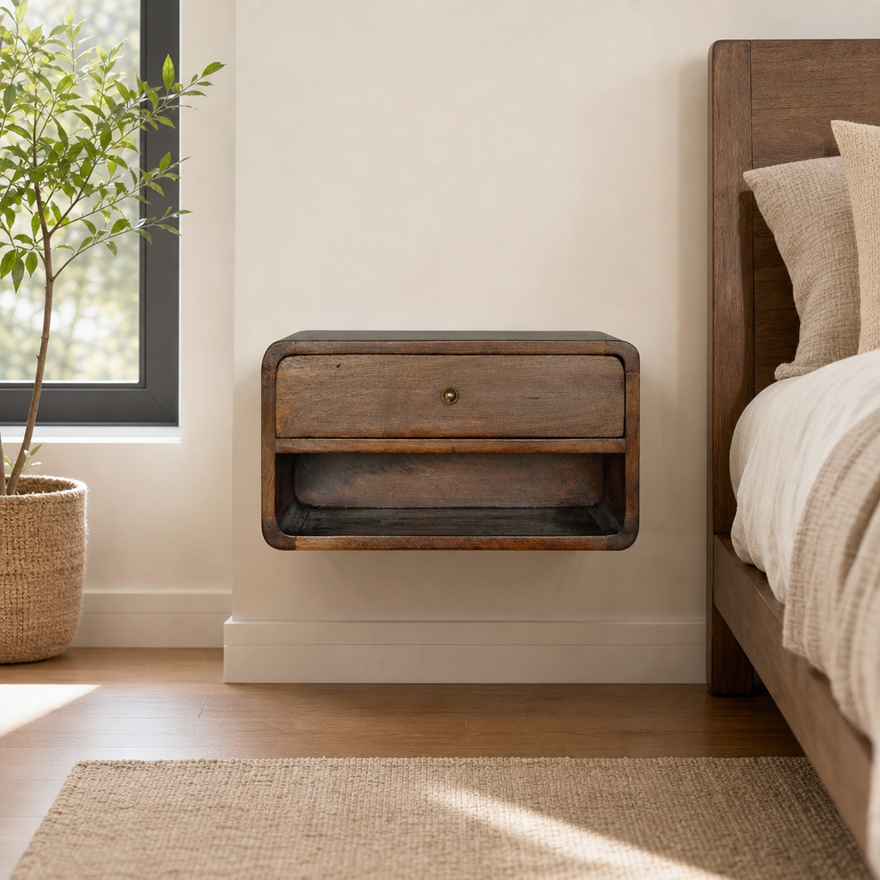 Floating Nightstand in Chestnut Mango Wood with Drawer and Open Shelf centered in a warm neutral furnished room