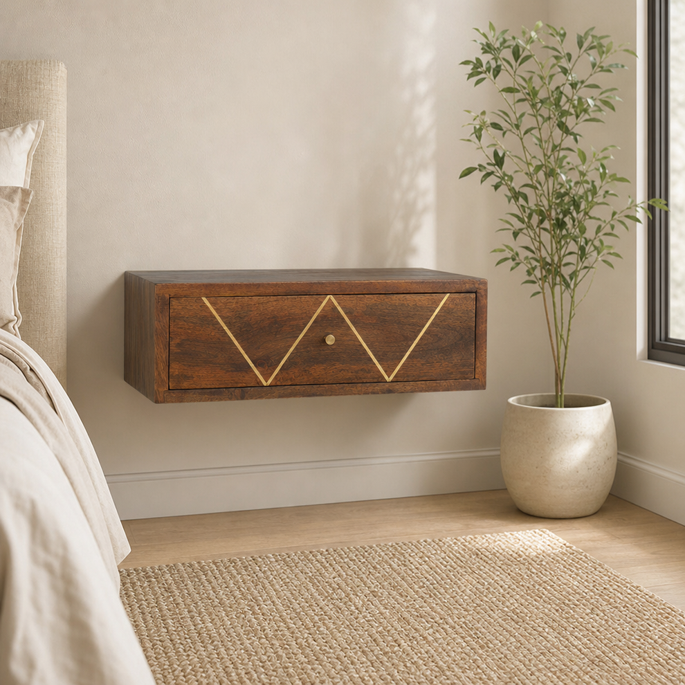 Wall-Mounted Mango Wood Nightstand with Brass Inlay Drawer centered in a warm neutral furnished room