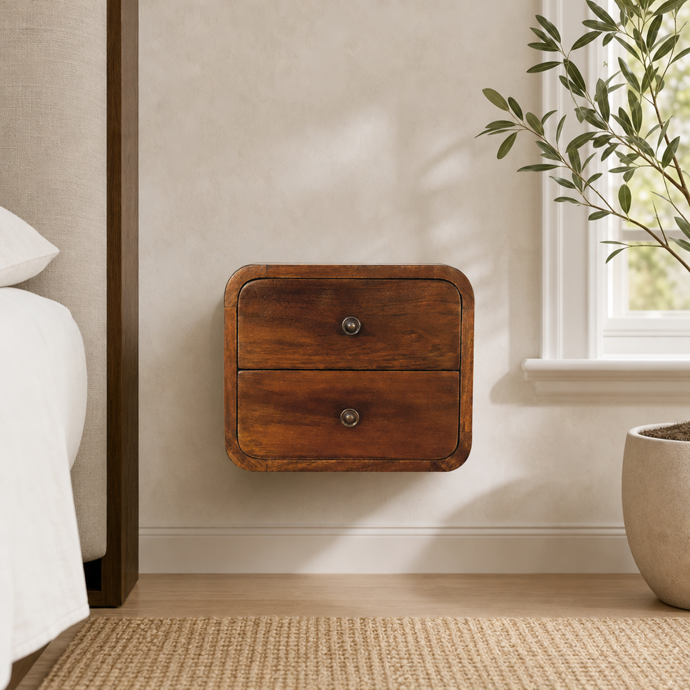 Wall-Mounted Mini Chestnut Mango Wood Nightstand with 2 Drawers centered in a warm neutral furnished room