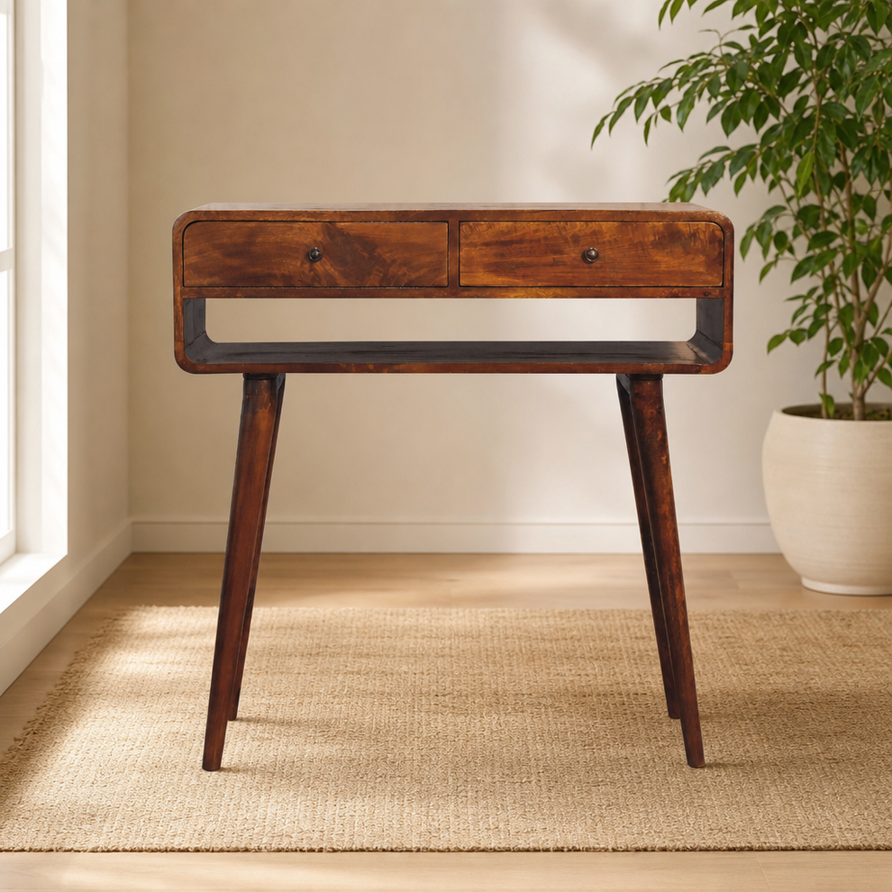 Chestnut Mango Wood Console Table with Two Drawers centered in a warm neutral furnished room