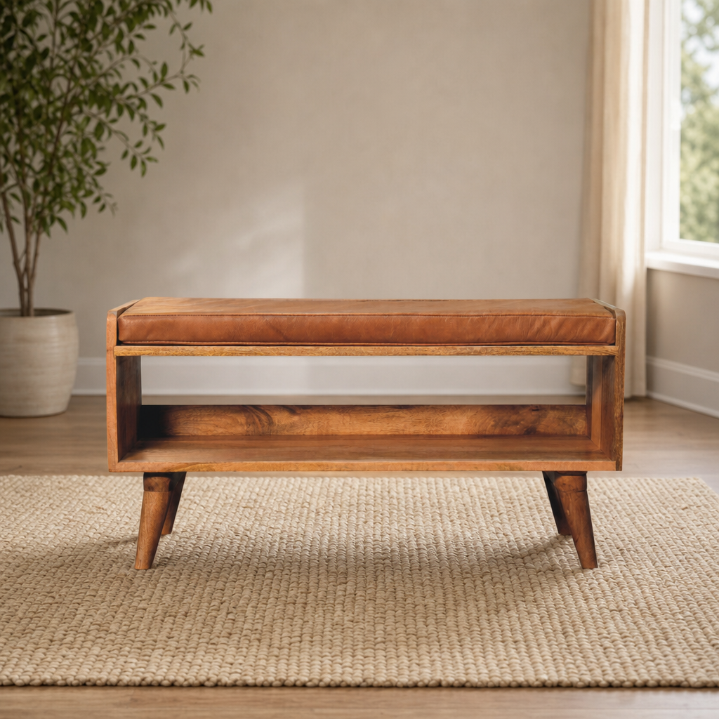 Solid Mango Wood Bench with Tan Leather Seat Pad centered in a warm neutral furnished room