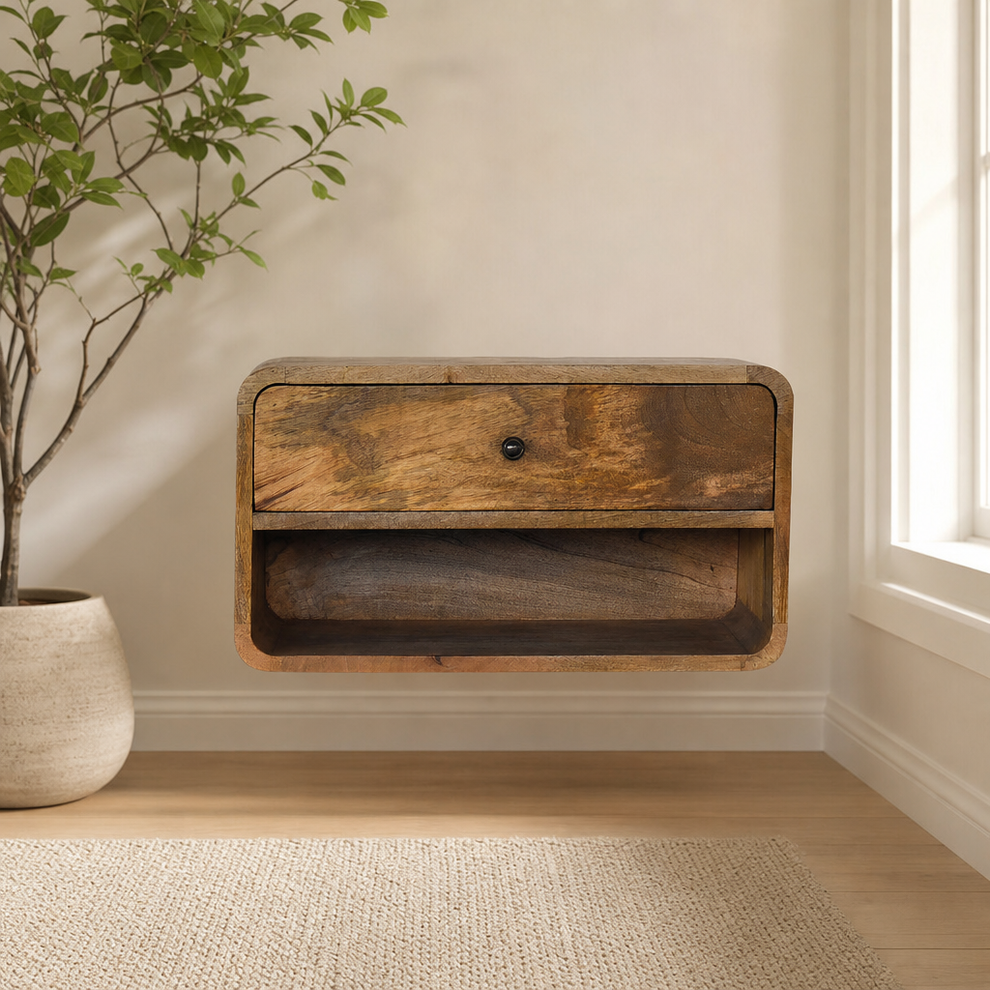 Large Floating Curve Open Slot Bedside centered in a warm neutral furnished room