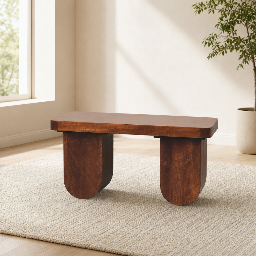 Chunky Solid Mango Wood Coffee Table - Chestnut Finish centered in a warm neutral furnished room