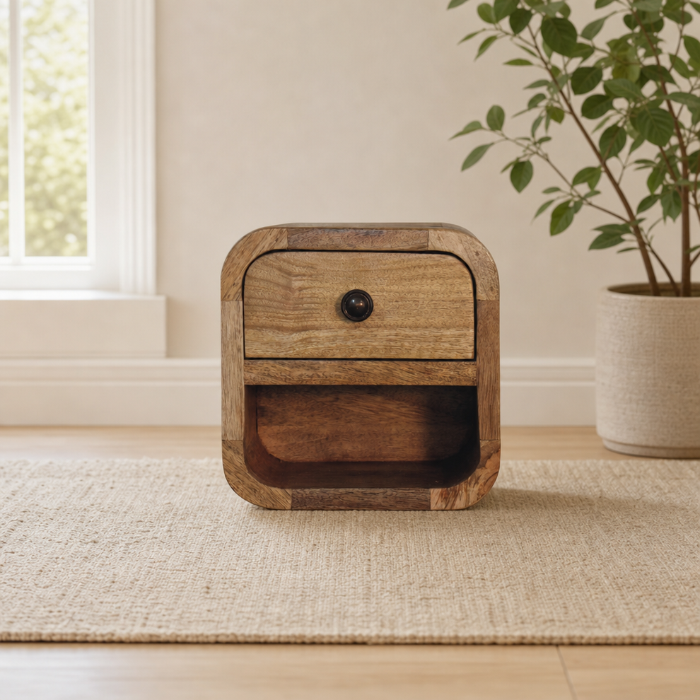 Extra Mini Curved Oak-ish Bedside with Open Slot centered in a warm neutral furnished room