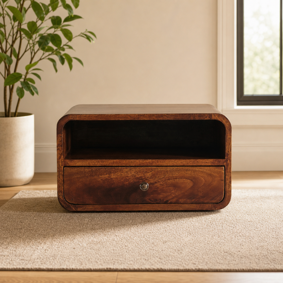 Floating Curve Bedside Table with Drawer and Open Shelf centered in a warm neutral furnished room