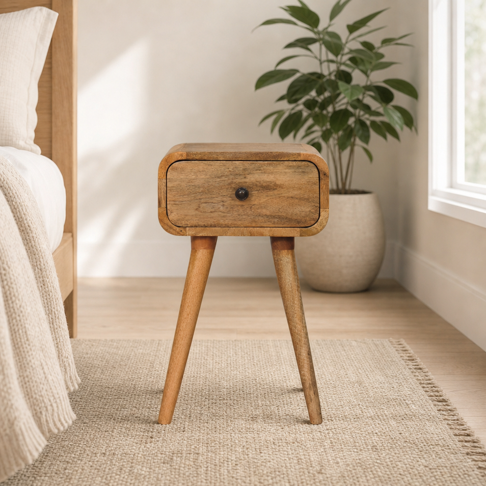 Avora Mini Oak-ish 100% Solid Mango Wood Nightstand, 1 Drawer centered in a warm neutral furnished room