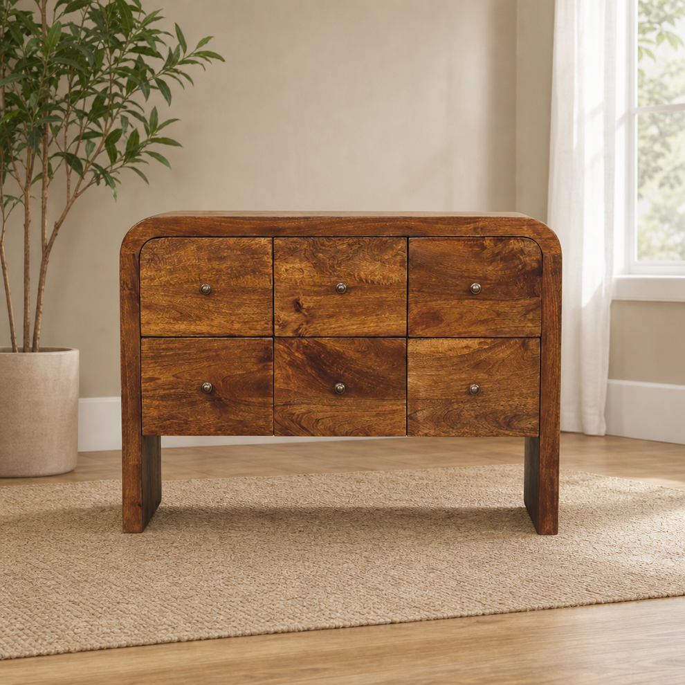 Darcy 3 over 3 Drawer Chest in Chestnut Finish centered in a warm neutral furnished room