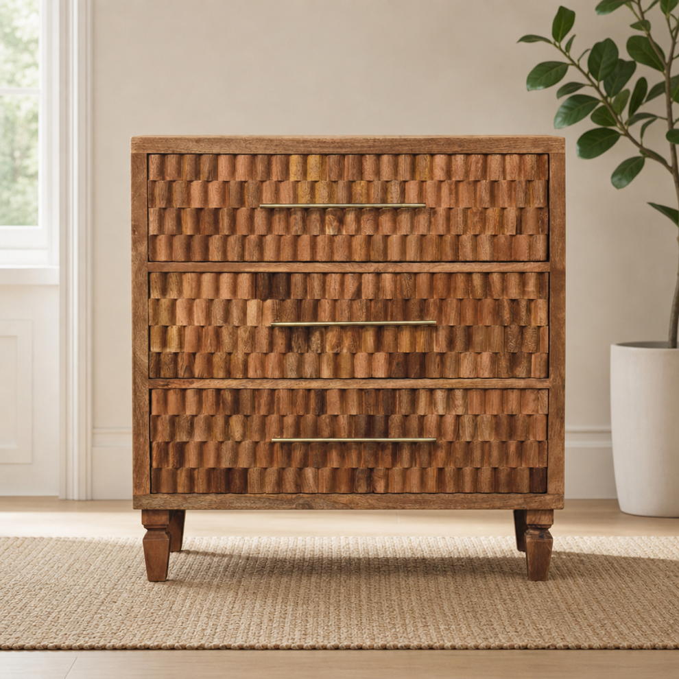 Cadiz Carved Storage Chest centered in a warm neutral furnished room