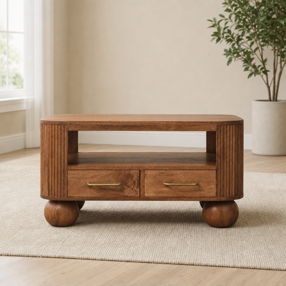 Briarwood Fluted Coffee Table centered in a warm neutral furnished room