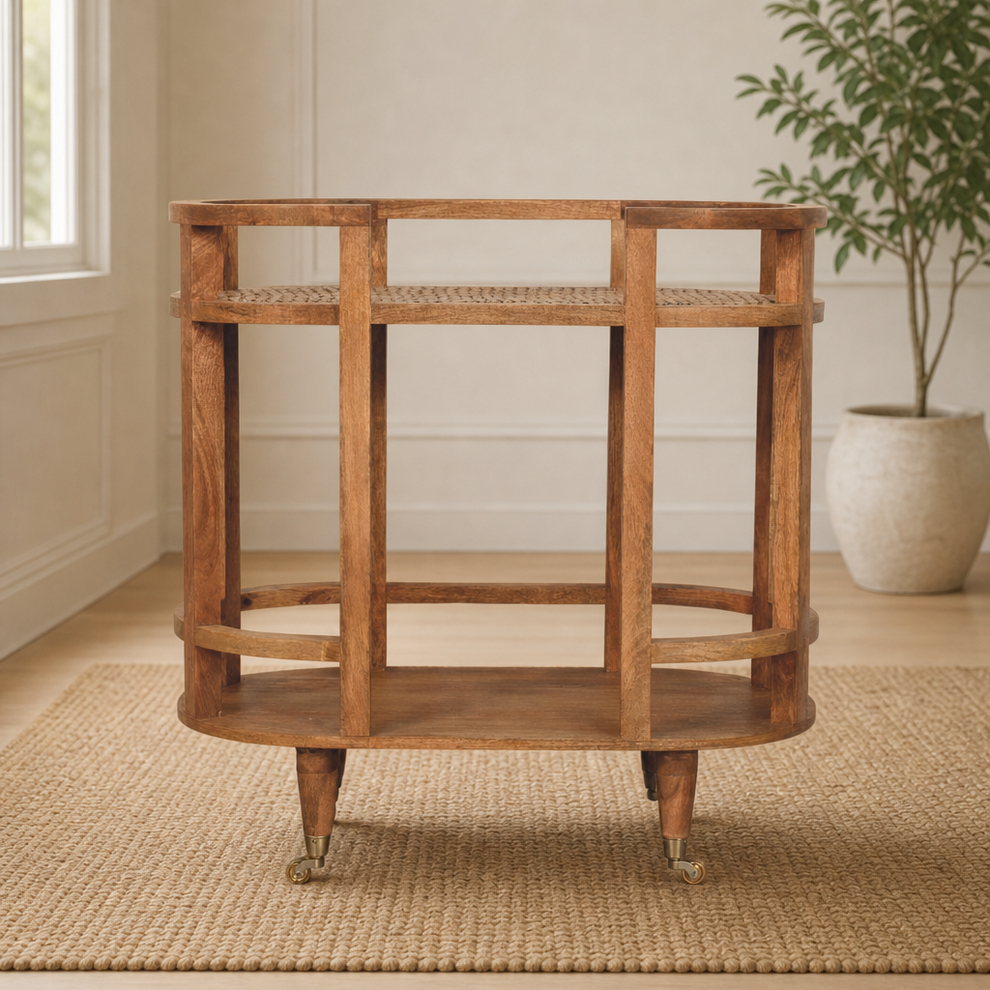 Saffron Rattan Butler Table centered in a warm neutral furnished room