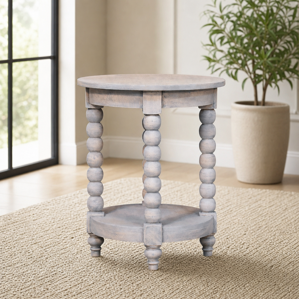Spindle Washed Round End Table centered in a warm neutral furnished room