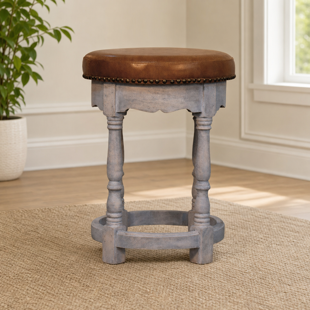 Rustic Charm Stool centered in a warm neutral furnished room