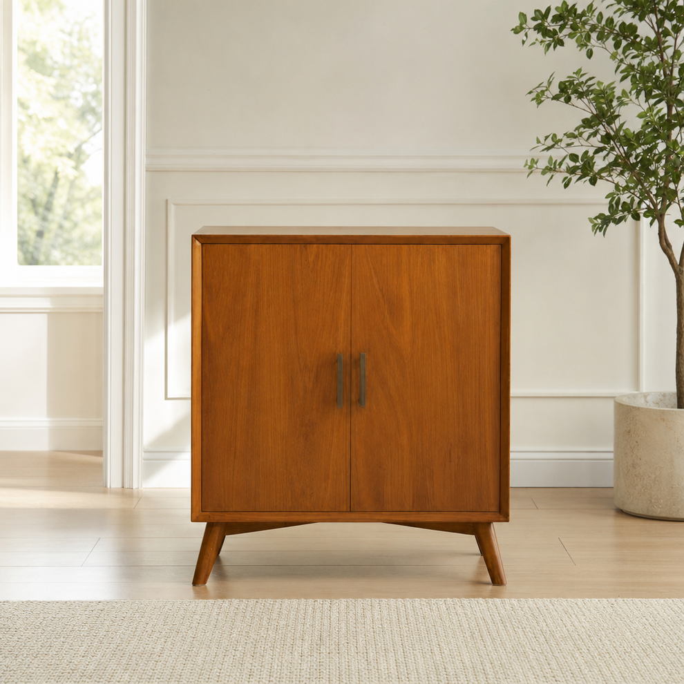Flynn Small Bar Cabinet centered in a warm neutral furnished room