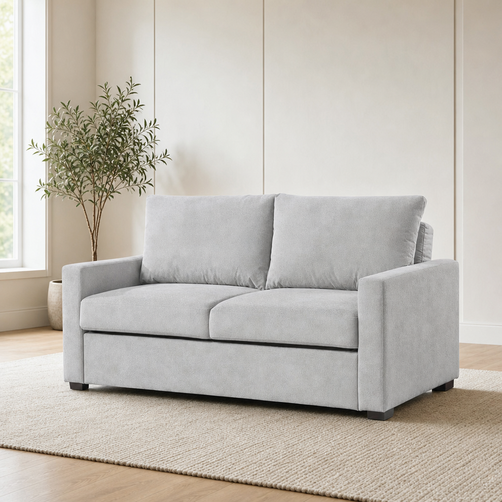 Dena Sleeper Sofa, Light Grey centered in a warm neutral furnished room