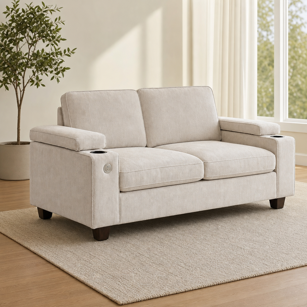 Beige chenille loveseat angled front view showing squared armrests, cup holders and tapered wooden legs on a rug