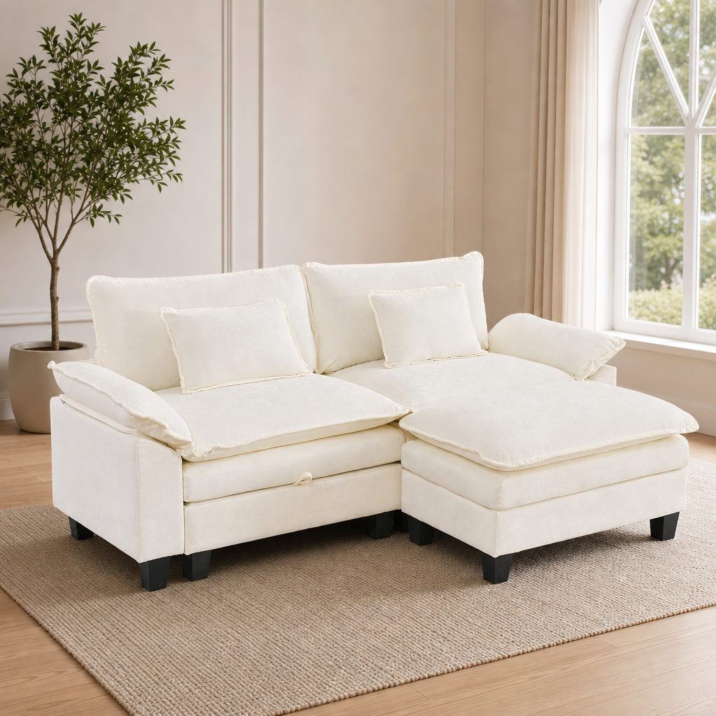 Cream upholstered modular sectional with ottoman, angled front view on a rug in a living room setting