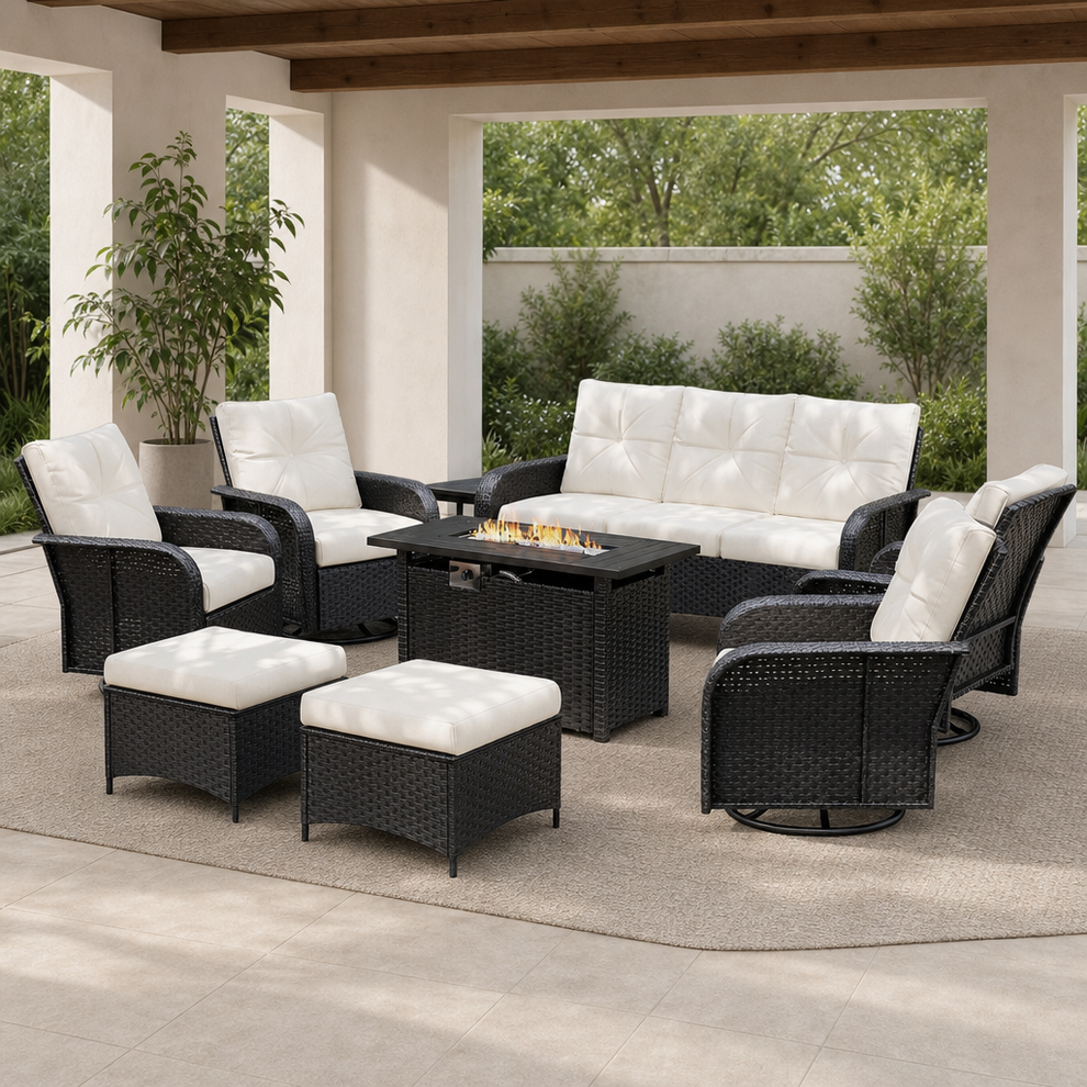 Dark wicker patio set with cream cushions arranged around a rectangular fire pit table under a pergola