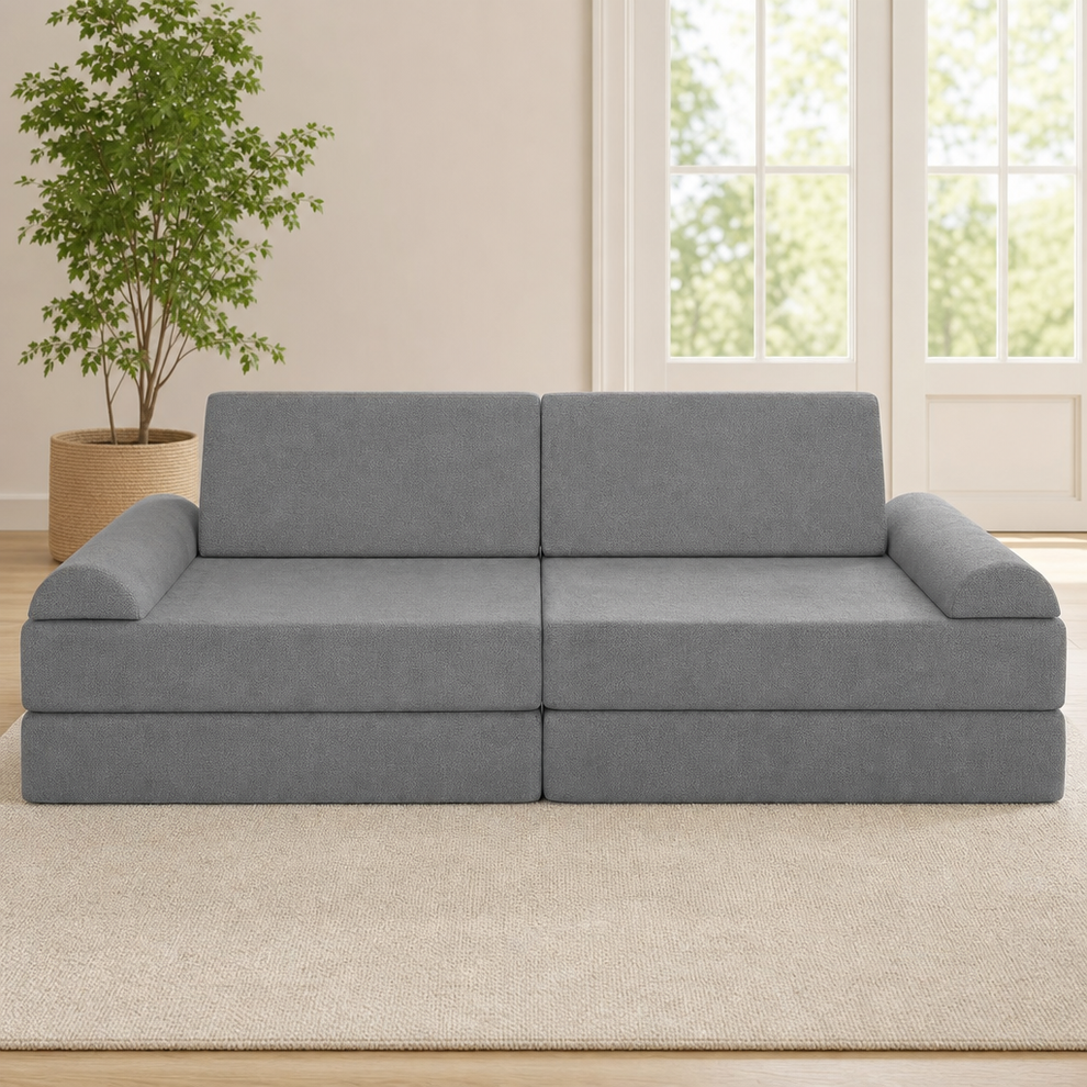 Modular Kids Play Couch - 10-Piece Foam Play Sofa for Toddlers centered in a warm neutral furnished room